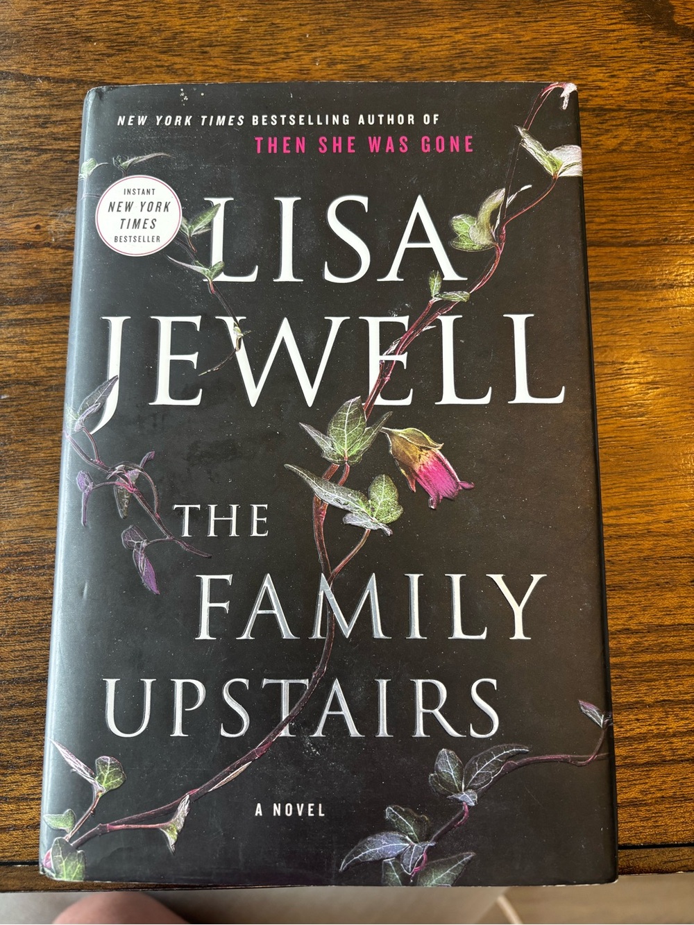 "The Family Upstairs" Hardcover - Black